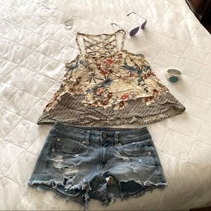 Cute flowy tank top with adorable detail in back